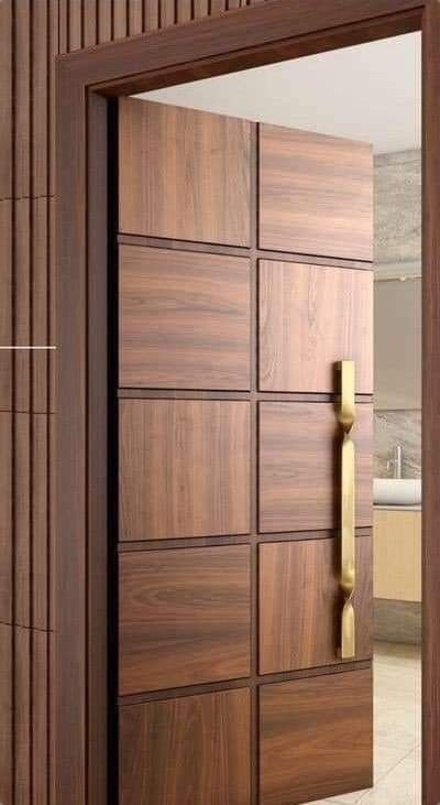 Classic wooden main door with gold handle - Gurgaon